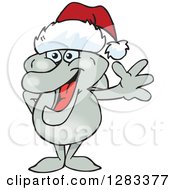 Clipart Of A Friendly Waving Dolphin Wearing A Christmas Santa Hat Royalty Free Vector Illustration
