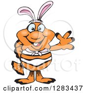 Clipart Of A Friendly Waving Clownfish Wearing Easter Bunny Ears Royalty Free Vector Illustration by Dennis Holmes Designs