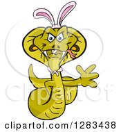 Clipart Of A Friendly Waving Cobra Snake Wearing Easter Bunny Ears Royalty Free Vector Illustration