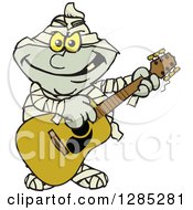 Poster, Art Print Of Cartoon Mummy Playing An Acoustic Guitar