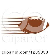 Clipart Of A Brown American Football With Speed Trails Royalty Free Vector Illustration