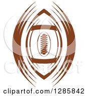 Clipart Of A Brown American Football With Swooshes Royalty Free Vector Illustration