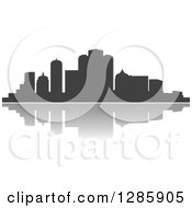 Clipart Of A Dark Gray Silhouetted City Skyline And Reflection Royalty Free Vector Illustration