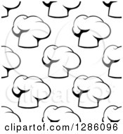 Clipart Of A Seamless Pattern Background Of Black And White Chef Hats Royalty Free Vector Illustration