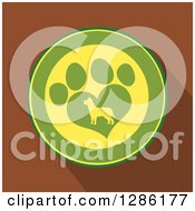 Poster, Art Print Of Modern Flat Design Of A Green And Yellow Circle Of A Silhouetted Dog In A Heart Shaped Paw Print Over Brown With Shadows