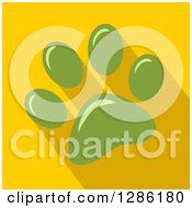Clipart Of A Modern Flat Design Of A Green Pet Paw Print And Shadows On Yellow Royalty Free Vector Illustration by Hit Toon