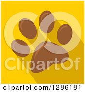 Poster, Art Print Of Modern Flat Design Of A Brown Pet Paw Print And Shadows On Yellow
