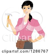 Happy Young Asian Woman Holding A Hammer And Wearing A Tool Belt