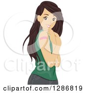 Happy Brunette White Woman Showing Off A Bandage After Getting A Vaccine