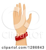 Caucasian Hand Wearing A Red Baller Bracelet