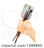 Clipart Of A White Hand Holding Paintbrushes Royalty Free Vector Illustration