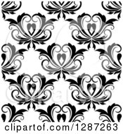Clipart Of A Seamless Background Design Pattern Of Black And White Vintage Floral Hearts 2 Royalty Free Vector Illustration