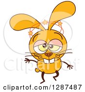 Clipart Of A Cartoon Dizzy Yellow Rabbit Royalty Free Vector Illustration