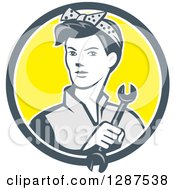 Clipart Of A Retro Female Mechanic Holding A Wrench In A Gray White And Yellow Circle Royalty Free Vector Illustration