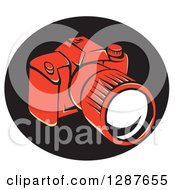Clipart Of A Retro Styled Red DSLR Camera In A Black Oval Royalty Free Vector Illustration