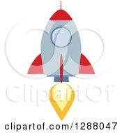Clipart Of A Modern Flat Design Of A Red And Metal Rocket Taking Off Royalty Free Vector Illustration by Hit Toon