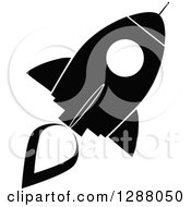 Clipart Of A Modern Flat Design Of A Black And White Rocket Royalty Free Vector Illustration