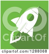 Poster, Art Print Of Modern Flat Design Of A White Rocket With A Shadow On Green