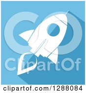 Poster, Art Print Of Modern Flat Design Of A White Rocket With A Shadow On Blue