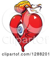 Clipart Of A Red Heart With A Blue Eyeball And Orange Flames Royalty Free Vector Illustration