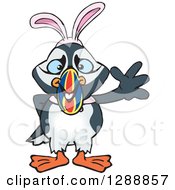 Cartoon Happy Puffin Bird Wearing A Christmas Sant Hat And Waving