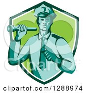 Poster, Art Print Of Retro Male Police Officer Shining A Flashlight And Pointing In A Navy Blue White And Green Shield