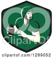 Poster, Art Print Of Retro Male American Football Player Throwing In A Black And Green Shield