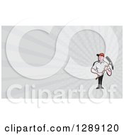 Clipart Of A Cartoon Male Construction Worker Holding A Pickaxe And Gray Rays Background Or Business Card Design Royalty Free Illustration