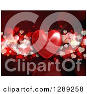 Clipart Of A Shiny 3d Heart Over Heart Bokeh On Dark Red Royalty Free Illustration