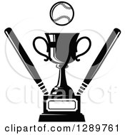 Clipart Of A Black And White Softball Or Baseball By A Sports Championship Trophy With Bats Royalty Free Vector Illustration