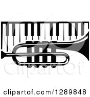 Black And White Trumpet Over Piano Keys