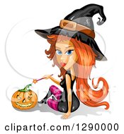 Poster, Art Print Of Red Haired Attractive Halloween Witch Holding A Wand By A Jackolantern Pumpkin
