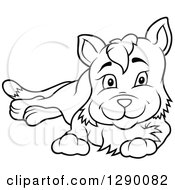 Clipart Of A Black And White Resting Cartoon Cat Royalty Free Vector Illustration