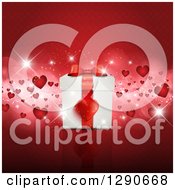 Clipart Of A 3d Anniversary Or Valentines Day Gift Box Over Red Flares And Hearts Royalty Free Vector Illustration