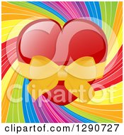 Poster, Art Print Of Shiny Red Valentine Love Heart Wrapped Ina Yellow Bow Over A Rainbow Swirl