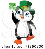 Poster, Art Print Of Cute St Patricks Day Leprechaun Penguin Holding A Four Leaf Clover