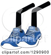 Pair Of Sitting Legs Wearing Blue Tennis Shoes