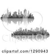 Poster, Art Print Of Multi Toned Gray Silhouetted City Skylines And Reflections