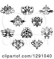 Clipart Of Black And White Vintage Flower Design Elements Royalty Free Vector Illustration