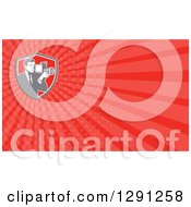 Clipart Of A Retro Professional Camera Man And Red Rays Background Or Business Card Design Royalty Free Illustration