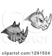 Clipart Of Fierce Gray Rhino Faces With Red Eyes Facing Right Royalty Free Vector Illustration