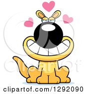 Clipart Of A Cartoon Loving Sitting Yellow Kangaroo With Hearts Royalty Free Vector Illustration by Cory Thoman