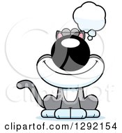 Clipart Of A Cartoon Happy Gray And White Cat Dreaming Or Thinking Royalty Free Vector Illustration