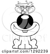 Fantasy Clipart Of A Black And White Cartoon Drunk Or Dizzy Jackalope Sitting Royalty Free Lineart Vector Illustration