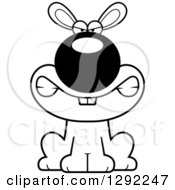 Animal Clipart Of A Black And White Cartoon Mad Snarling Rabbit Sitting Royalty Free Lineart Vector Illustration