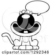 Animal Clipart Of A Black And White Cartoon Happy Cat Talking Royalty Free Lineart Vector Illustration