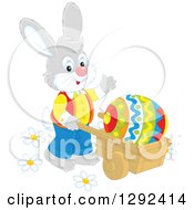 Poster, Art Print Of Happy Gray Easter Rabbit Pushing A Giant Egg In A Wheelbarrow And Waving