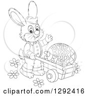 Poster, Art Print Of Happy Black And White Easter Bunny Pushing A Giant Egg In A Wheelbarrow And Waving