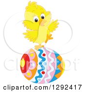 Poster, Art Print Of Cute Yellow Easter Chick Balancing On A Decorated Egg