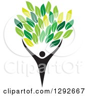 Clipart Of A Silhouetted Black Person Forming The Trunk Of A Tree With Green Leaves Royalty Free Vector Illustration